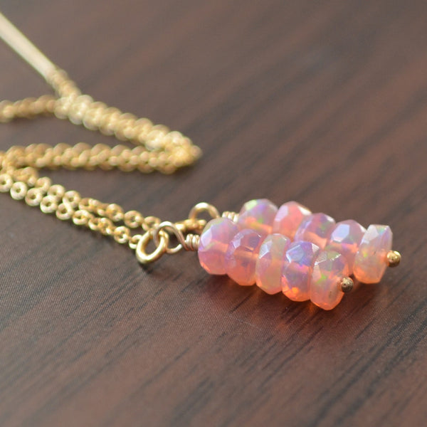 Pink Ethiopian Opal Earrings in Gold with Faceted Stones