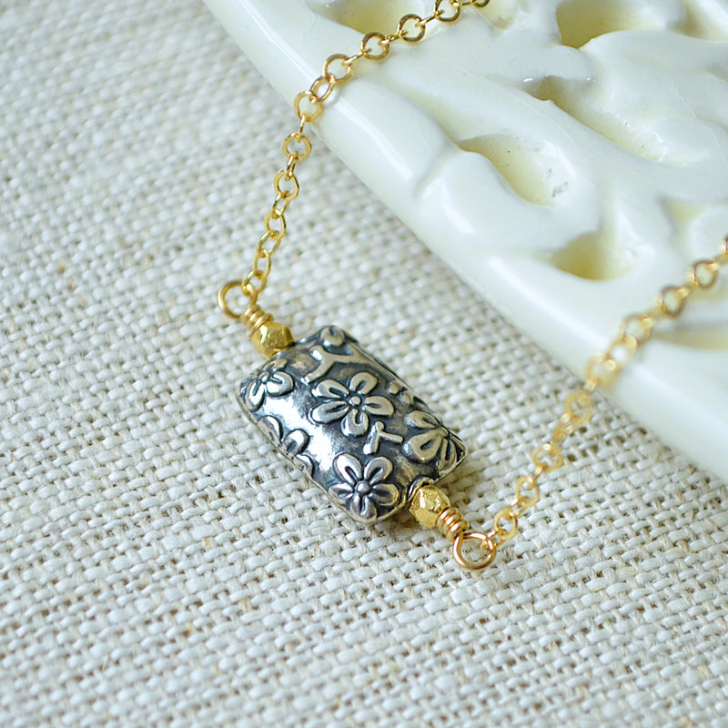 Gold Choker Necklace with Silver Floral Bead