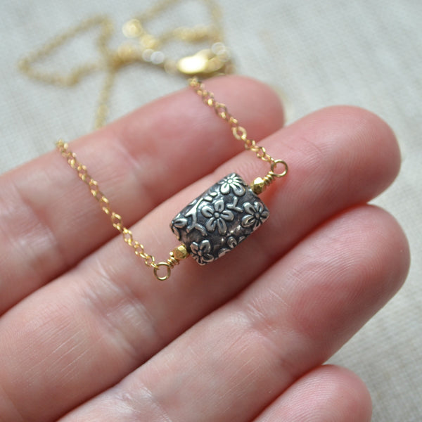 Gold Choker Necklace with Silver Floral Bead
