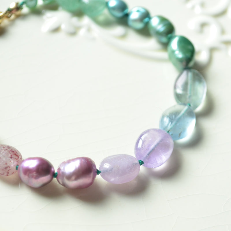 Hand Knotted Bracelet with Teal and Purple Stones