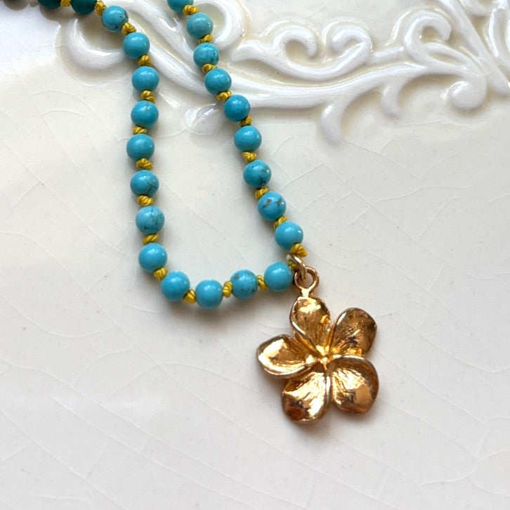 Turquoise Hand Knotted Necklace with Gold Flower Charm