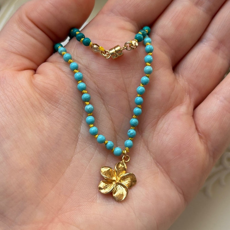 Turquoise Hand Knotted Necklace with Gold Flower Charm