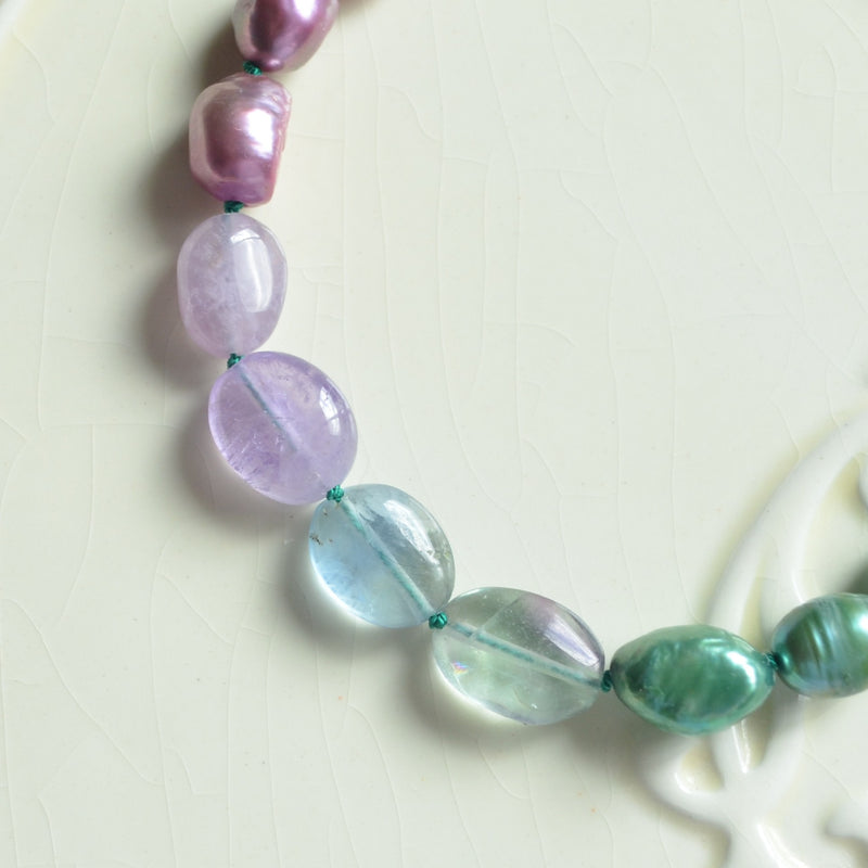 Hand Knotted Bracelet with Teal and Purple Stones