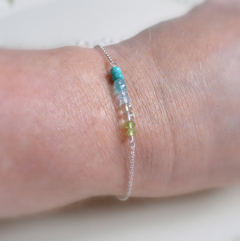 Silver Bracelet with Turquoise, Blue Topaz, and Peridot