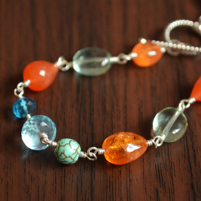Sterling Silver Bracelet with Carnelian, and Blue Topaz