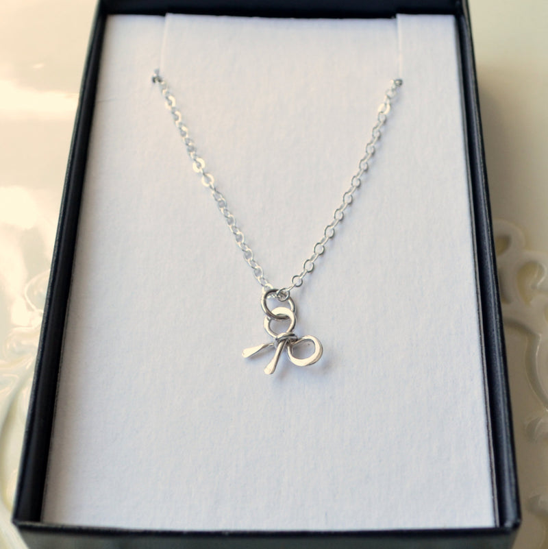Tiny Bow Necklace in Sterling Silver