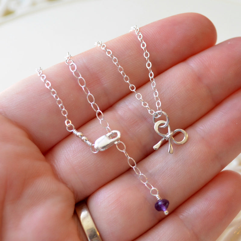 Tiny Bow Necklace in Sterling Silver