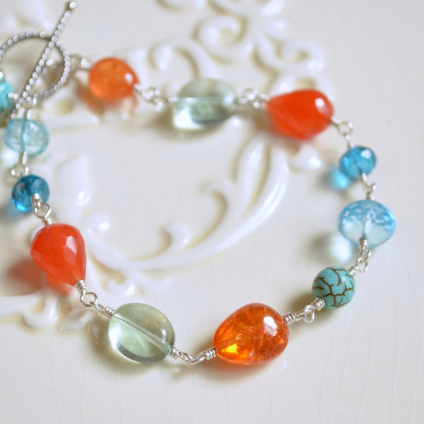 Sterling Silver Bracelet with Carnelian, and Blue Topaz